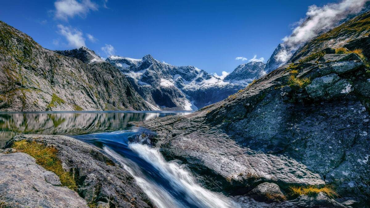 A majestic blend of fjords, rainforests, and towering peaks—raw, untamed, and unforgettable. A majestic blend of fjords, rainforests, and towering peaks—raw, untamed, and unforgettable.